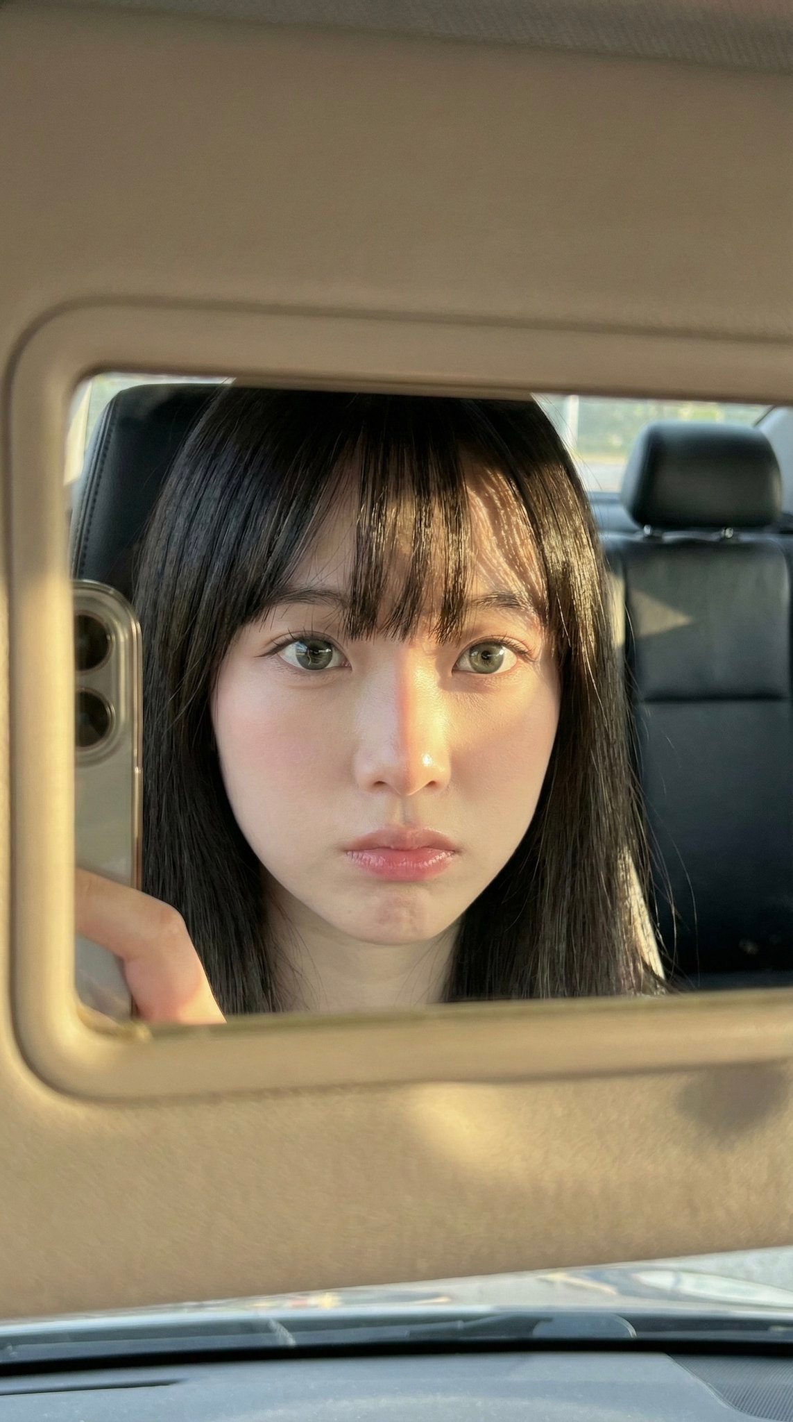 Car visor mirror selfie: GPT Image 2 prompt