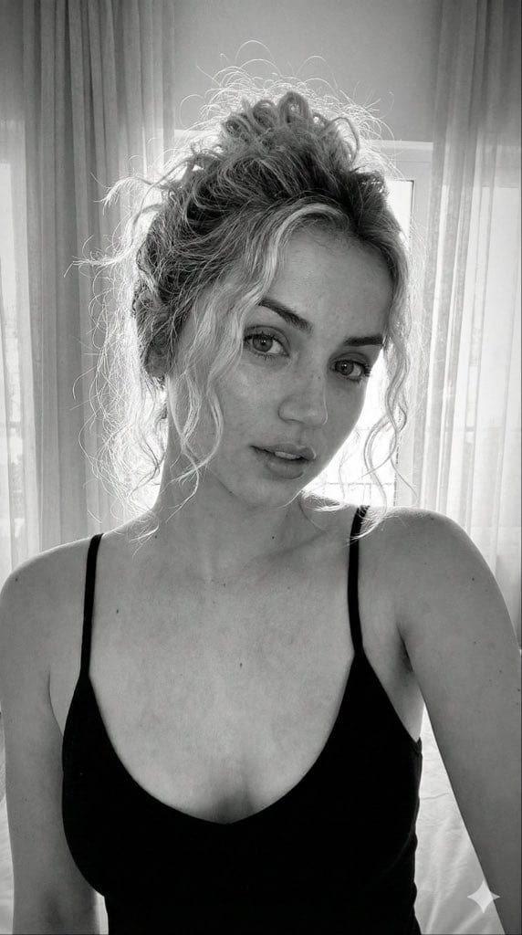 Freckled blonde messy bun portrait: GPT Image 2 prompt