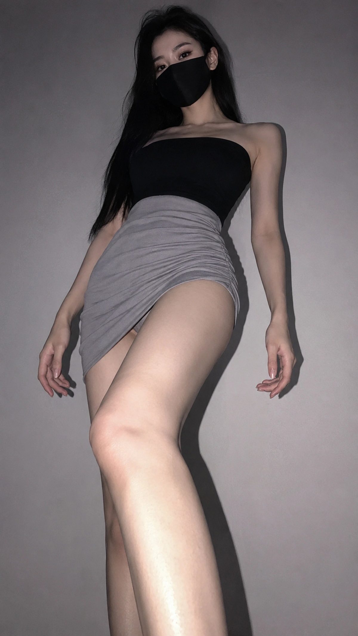 Black-mask low-angle fashion selfie: GPT Image 2 prompt